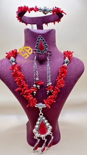 ac2ee98e-ce37-4825-81ef-759bc3662b61 Parrure demi sautoire ( faux corails )